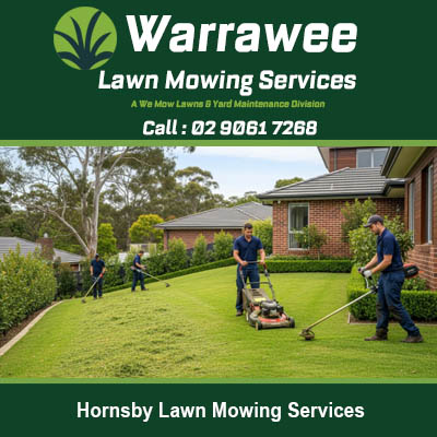 Lawn care team actively mowing sloped residential property with multiple workers in Hornsby NSW
