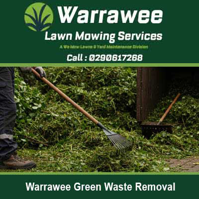 Worker raking up garden debris in Warrawee