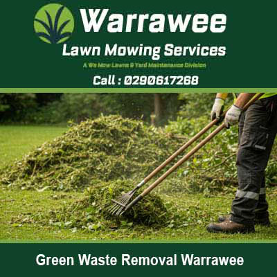 Worker using rake to collect green waste Warrawee